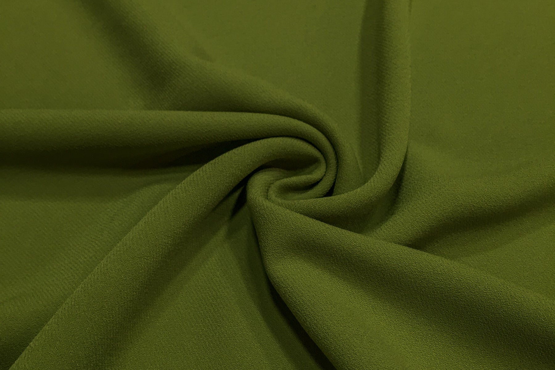 Yesil krep kumas yakin cekim - dokumlu ve mat yuzey